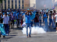 עימותים בדרום תל אביב בין מתנגדי המשטר באריתריאה ותומכיו / צילום: Associated Press, Ohad Zwigenberg