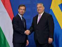 ראש ממשלת טורקיה ויקטור אורבן וראש ממשלת שבדיה אולף כריסטנסן / צילום: Associated Press, Denes Erdos