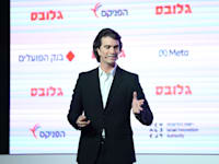 אדם נוימן, מייסד ושותף WeWork & Flow, בוועידת ישראל לעסקים / צילום: שלומי יוסף