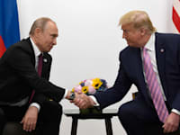 טראמפ ופוטין / צילום: ap, Susan Walsh