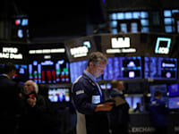 סוחרים בבורסת ניו יורק השבוע. ככה זה בכלכלה / צילום: Reuters