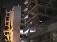 הפגיעה בבניין בבת ים מטיל איראני / צילום: Reuters, Anadolu Agency