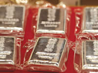 אונקיית כסף / צילום: Reuters, CFOTO