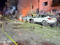 פגיעה של טיל איראני בבניין בתל אביב / צילום: כב''ה