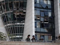 בניין ''הטיל'' בחיפה לאחר הפגיעה. חזרה חלקית רק במאי / צילום: Reuters, Florion Goga