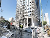 מגדל עלית ברמת גן לאחר פגיעת הטיל האיראני / צילום: Reuters