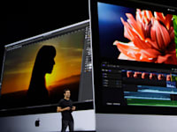 ג'ון טרנוס באחת ההכרזות של אפל / צילום: ap, Marcio Jose Sanchez