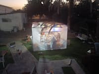 יושבים בסוכה. ה''איך'' הוא חלק מהמשמעות / צילום: גל חמו