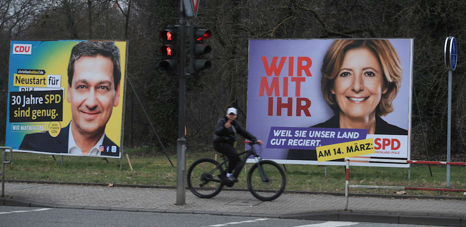 שלטי בחירות של מנהיגת ה-SPD מאלו דרייר והמועמד מטעם ה-CDU כריסטיאן בלדאוף בנויוויד בגרמניה / צילום: Reuters, Wolfgang Rattay