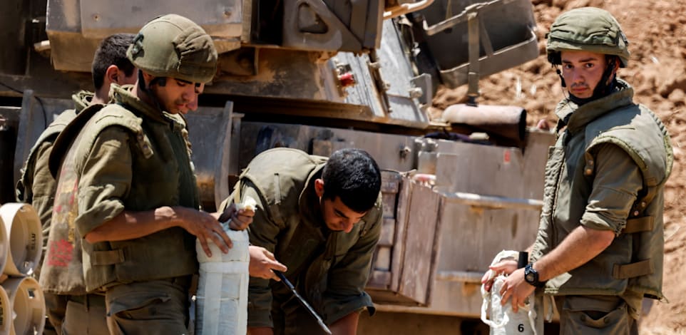 חיילי צה"ל בגבול עם עזה בזמן מבצע "שומר חומות" / צילום: Reuters, Amir Cohen
