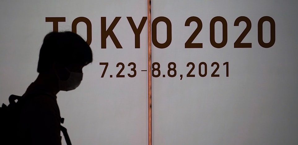 אלפי רופאים ואזרחים יפנים מתחננים לביטול המשחקים האולימפיים / צילום: Associated Press, Eugene Hoshiko