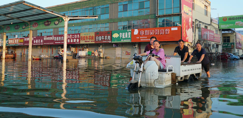 נזקי ההצפות בסין / צילום: Associated Press, Dake Kang