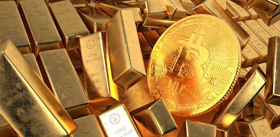 זהב או ביטקוין - מי מגן טוב יותר מפני אינפלציה / צילום: Reuters, Alexander Limbach via www.imago