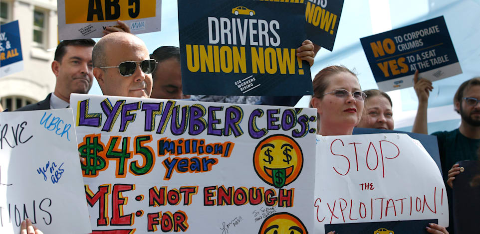 מפגינים בעד הפיכת עובדי כלכלת החלטורות למעוסקים, באוגוסט 2019 / צילום: Associated Press, Rich Pedroncelli