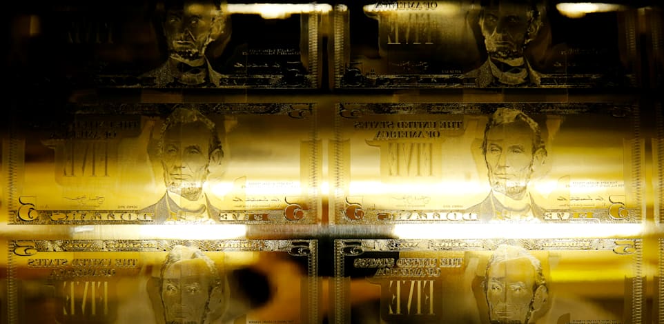 גלופה של שטרות של חמש דולר במטבעה של ארה''ב בוושינגטון הבירה / צילום: Reuters, Gary Cameron