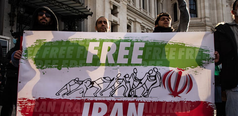 הפגנת תמיכה במחאה האיראנית במדריד / צילום: Reuters