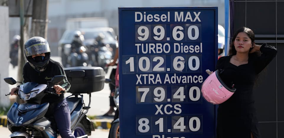 תחנת דלק בפיליפינים בסוף השבוע האחרון / צילום: ap, Aaron Favila