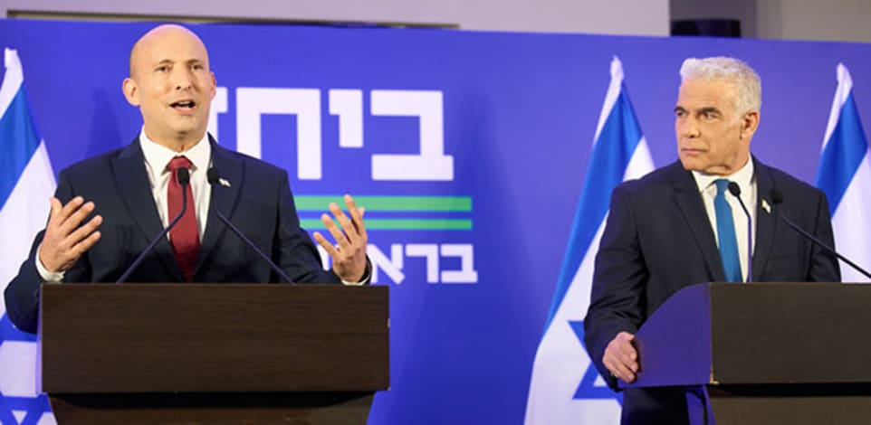 לפיד ובנט בעת ההצהרה על האיחוד / צילום: ap, Ariel Schalit