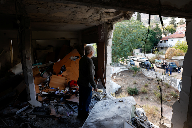 בית שנפגע בקריית שמונה בנובמבר 2024 / צילום: Reuters, Thomas Peter בית שנפגע בקריית שמונה בנובמבר 2024 / צילום: Reuters, Thomas Peter