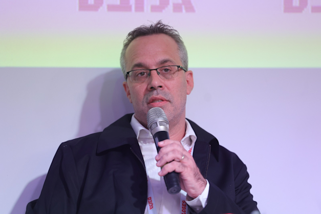 ארז מגדלי, מנהל ההשקעות של מגדל ביטוח, בכנס ההשקעות של גלובס / צילום: שלומי יוסף