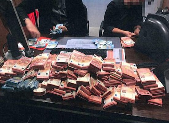 מזומן שנתפס על ידי הרשויות בבלגיה / צילום: Associated Press, Xavier Dellicour מזומן שנתפס על ידי הרשויות בבלגיה / צילום: Associated Press, Xavier Dellicour