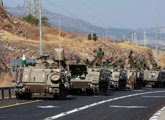 שיירה של חיילי צה''ל על הגבול עם לבנון, השבוע / צילום: Reuters, Ammar Awad