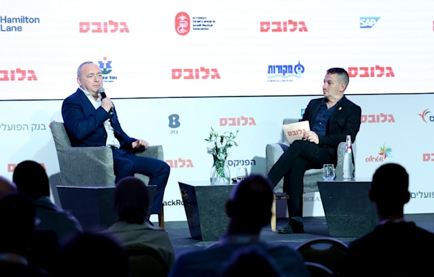 שאול שניידר, יו''ר נמל אשדוד, בשיחה עם כתב התחבורה אסף זגריזק בוועידת ישראל לעסקים של גלובס / צילום: שלומי יוסף שאול שניידר, יו''ר נמל אשדוד, בשיחה עם כתב התחבורה אסף זגריזק בוועידת ישראל לעסקים של גלובס / צילום: שלומי יוסף