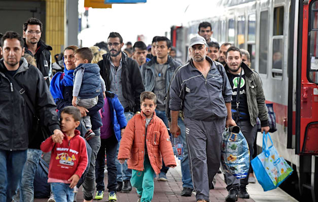פליטים סורים בגרמניה ב־2015. 1.3 מיליון פליטים עדיין באירופה / צילום: ap, Martin Meissner פליטים סורים בגרמניה ב־2015. 1.3 מיליון פליטים עדיין באירופה / צילום: ap, Martin Meissner