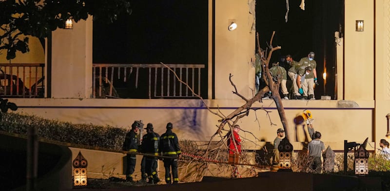 כוחות ביטחון בנלון בדובאי שנפגע בתקיפה איראנית / צילום: ap, Altaf Qadri