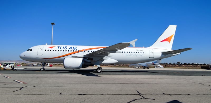 מטוס של טוס איירווייז / צילום: Elliott Kefalas