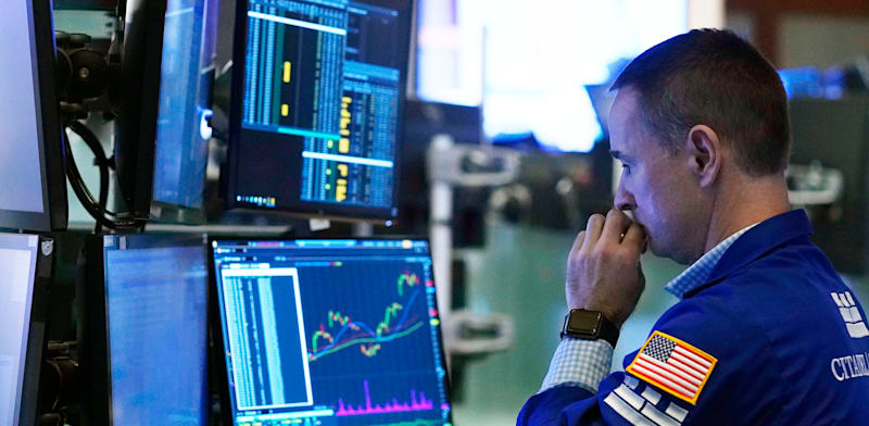 "סוחר בקומת המסחר בבורסת ניו יורק / צילום: Associated Press, Richard Drew"