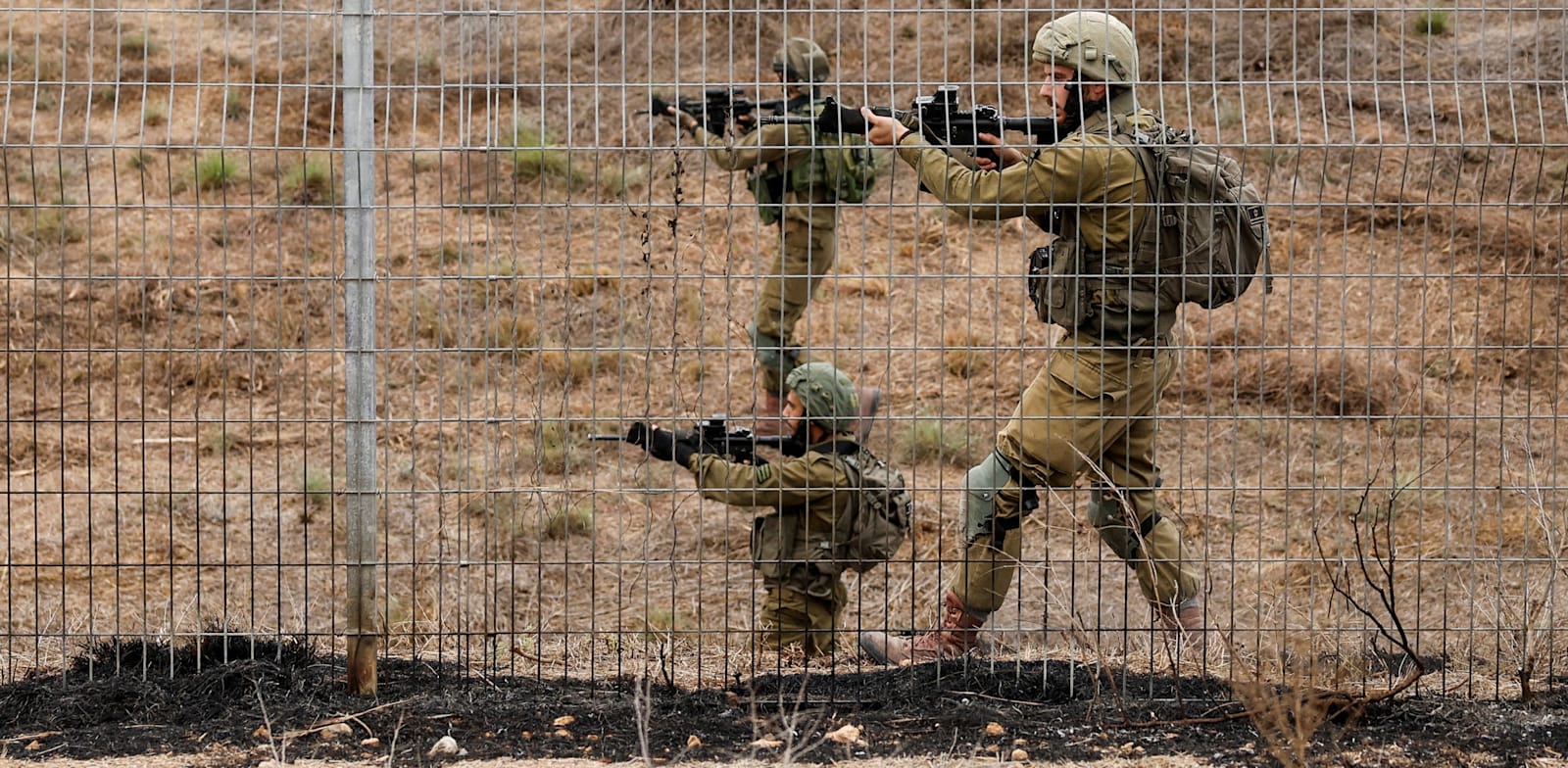 Combing the Gaza border fence credit: Reuters Amir Cohen