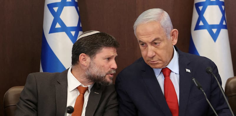 Minister of Finance Bezalel Smotrich and Prime Minister Benjamin Netanyahu credit: Reuters/Pool