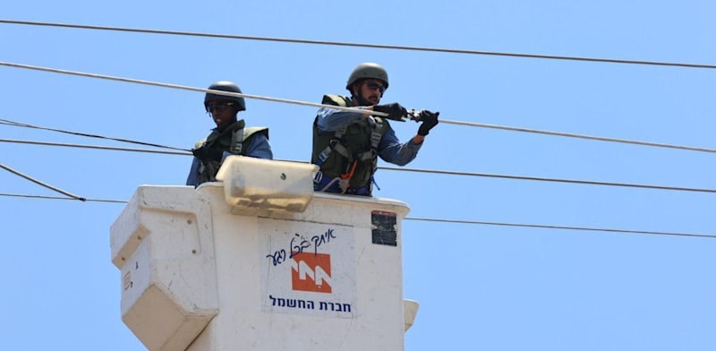 "עובדי חברת החשמל / צילום: יוסי וייס, חברת החשמל"