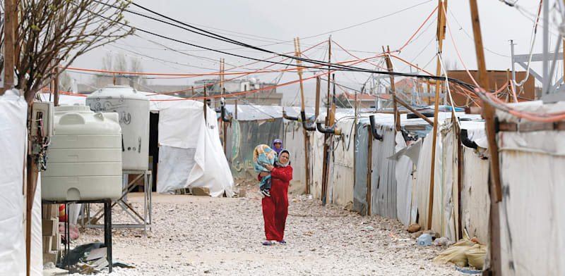 פליטים סורים בלבנון / צילום: Reuters, Mohamed Azakir