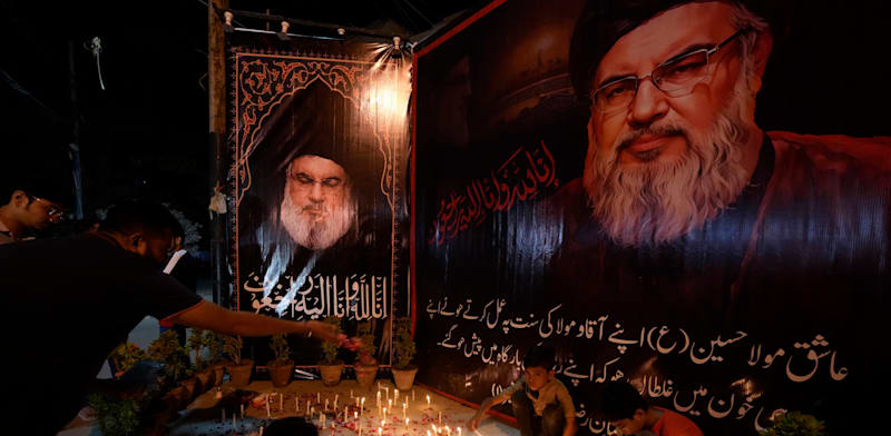 "מוסלמים שיעים מתאבלים על חסן נסראללה, פקיסטן / צילום: ap, Fareed Khan"