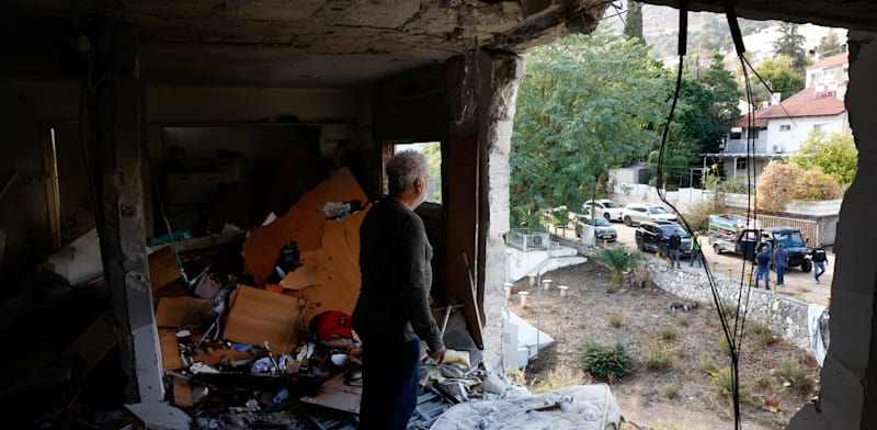 "בית שנפגע בקריית שמונה, בשבוע שעבר / צילום: Reuters, Thomas Peter"