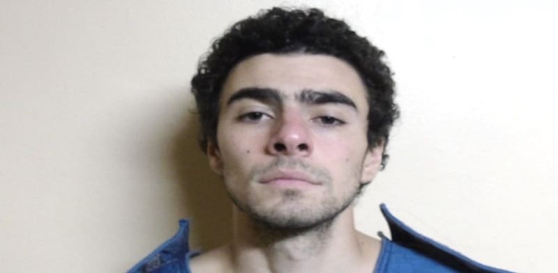 "לואיג'י מניון, המואשם ברצח מנכ''ל יונייטד הלת'קר, בריאן תומפסון / צילום: ap, רשות בתי הסוהר בפנסילבניה"