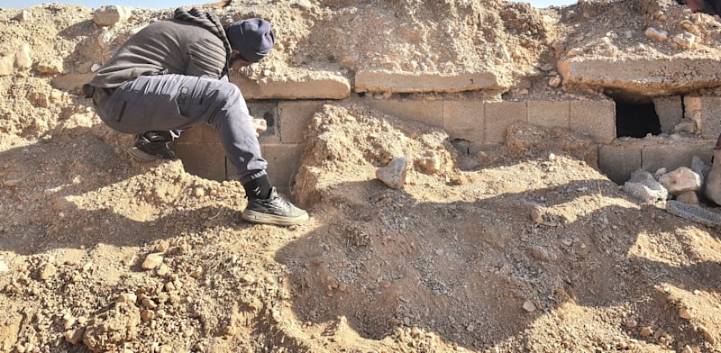 "קבר אחים נוסף שנחשף בפאתי דמשק / צילום: Reuters, Fadel Itani"