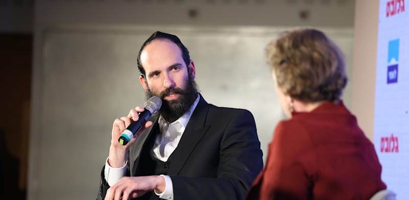 "יהודה מורגנשטרן, מנכ''ל משרד הבינוי והשיכון, בשיחה עם הלית ינאי-לויזון בכנס חוזרים לצפון של גלובס / צילום: שלומי יוסף"