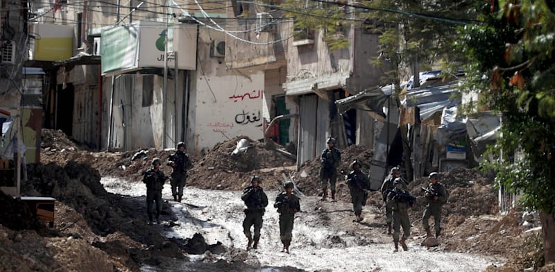 "כוחות צה''ל ברחובות טולכרם בתחילת החודש / צילום: Reuters, Issam Rimawi"