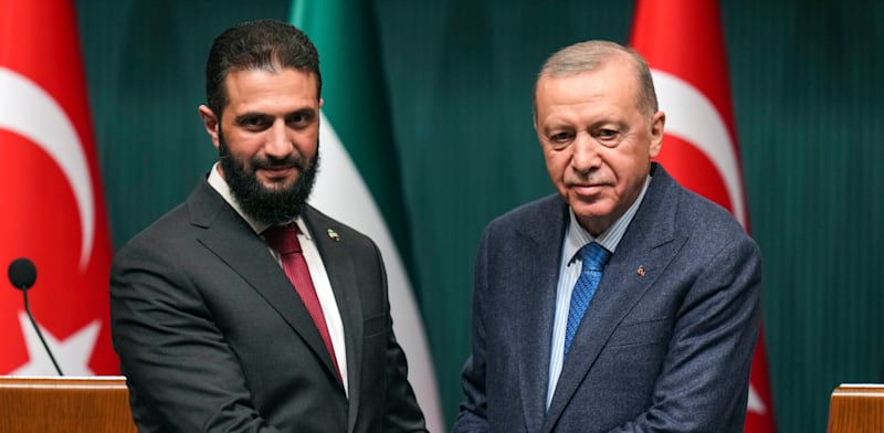 נשיא טורקיה ארדואן עם עמיתו הסורי, אחמד אל–שרע / צילום: ap, Francisco Seco