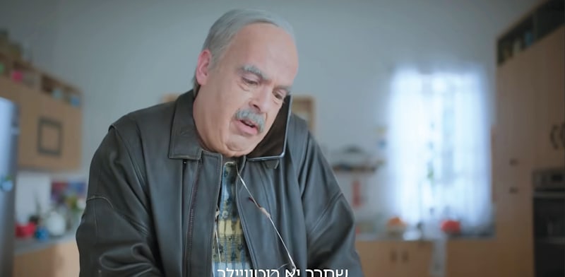 "אודי כגן בקמפיין ביטוח 9 / צילום: צילום מסך יוטיוב"