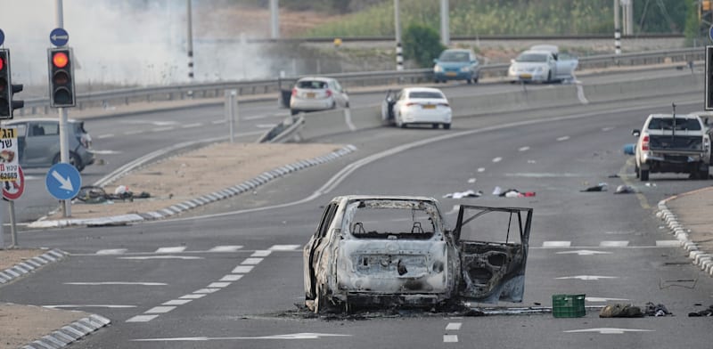 "הקרבות שהתחוללו בכבישים ב-7 באוקטובר / צילום: ap, Ohad Zwigenberg"