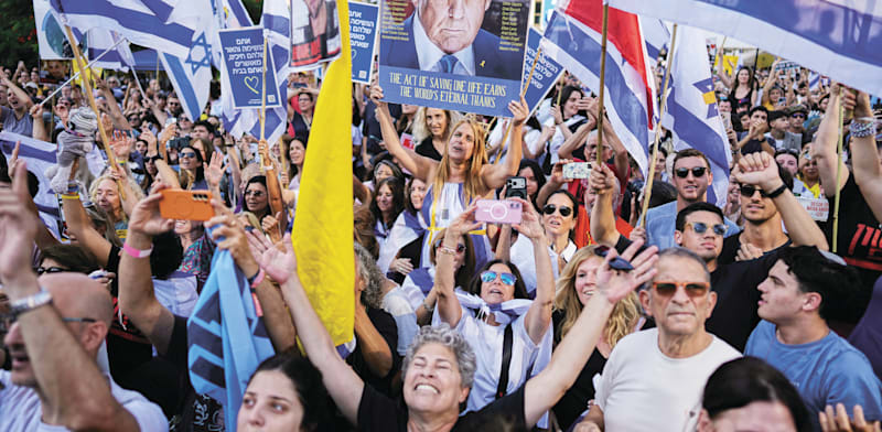 יום השחרור של החטופים החיים / צילום: ap, Oded Balilty