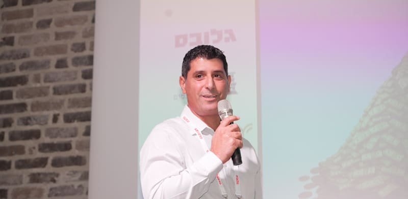 "ירון שמאי, מנהל חיסכון ארוך-טווח, סיכונים ובריאות במגדל ביטוח ופיננסים, בכנס ההשקעות של גלובס / צילום: כדיה לוי"