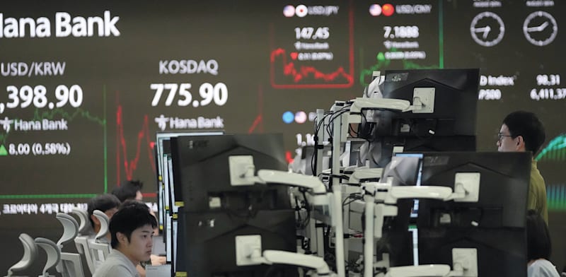 "בורסת KOSDAQ בסיאול / צילום: ap, Lee Jin-man"