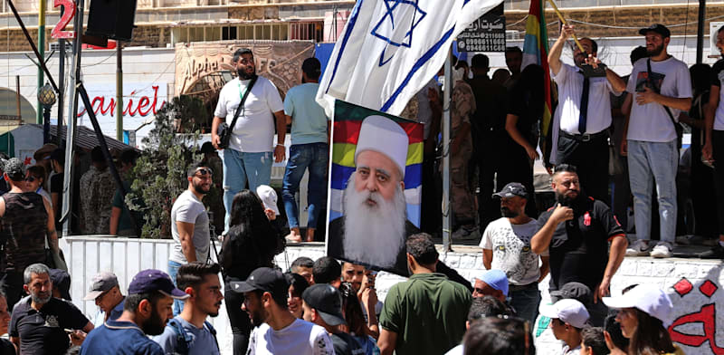 "דרוזים בדרום סוריה מניפים את דגל ישראל / צילום: ap, Fahd Kiwan"