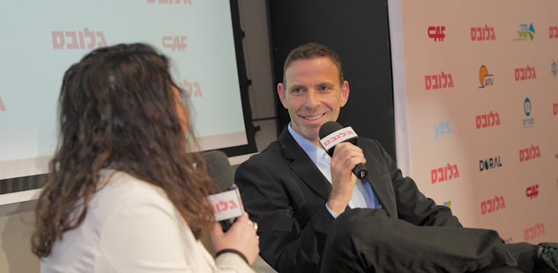 "אילן סיגל, מנכ''ל פלאפון ו-yes, בשיחה עם גלית חתן בכנס תשתיות לעתיד / צילום: כדיה לוי"