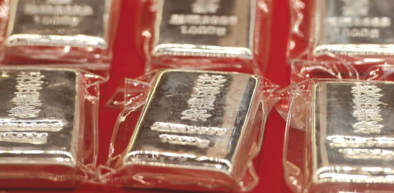 "אונקיית כסף / צילום: Reuters, CFOTO"